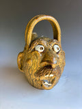 #6 Terry King Face Water Jug 8" to handle