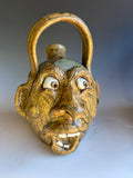 #8 Terry King Face Water Jug 8" to handle