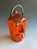 9-10" Jim Spires Bright Orange Face Jug
