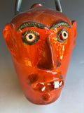 9-10" Jim Spires Bright Orange Face Jug