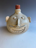 8" wood fired fave jug signed Sid Luck