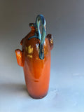 Jim Spires Modigliani style Face Jug 12" brilliant Orange